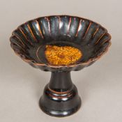 A Chinese Jishou ware type stem bowl With allover brown glaze and typically decorated. 10.