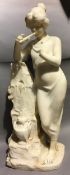 A 19th century carved marble sculpture Modelled as a young lady playing a double pipe,