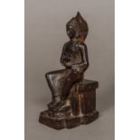 An antique Indian patinated bronze figure of Buddha Typically modelled seated. 16.5 cm high.