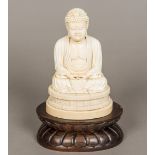 A good quality 19th century Japanese carved figure of Buddha Typically modelled,