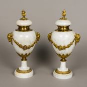 A pair of gilt bronze mounted white marble urns Of classical form,