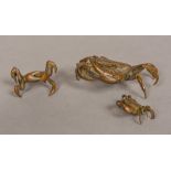 A set of three Japanese patinated bronze crabs Each naturalistically modelled,