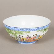 A Chinese Republic porcelain bowl Well painted with figures in a continuous garden landscape,