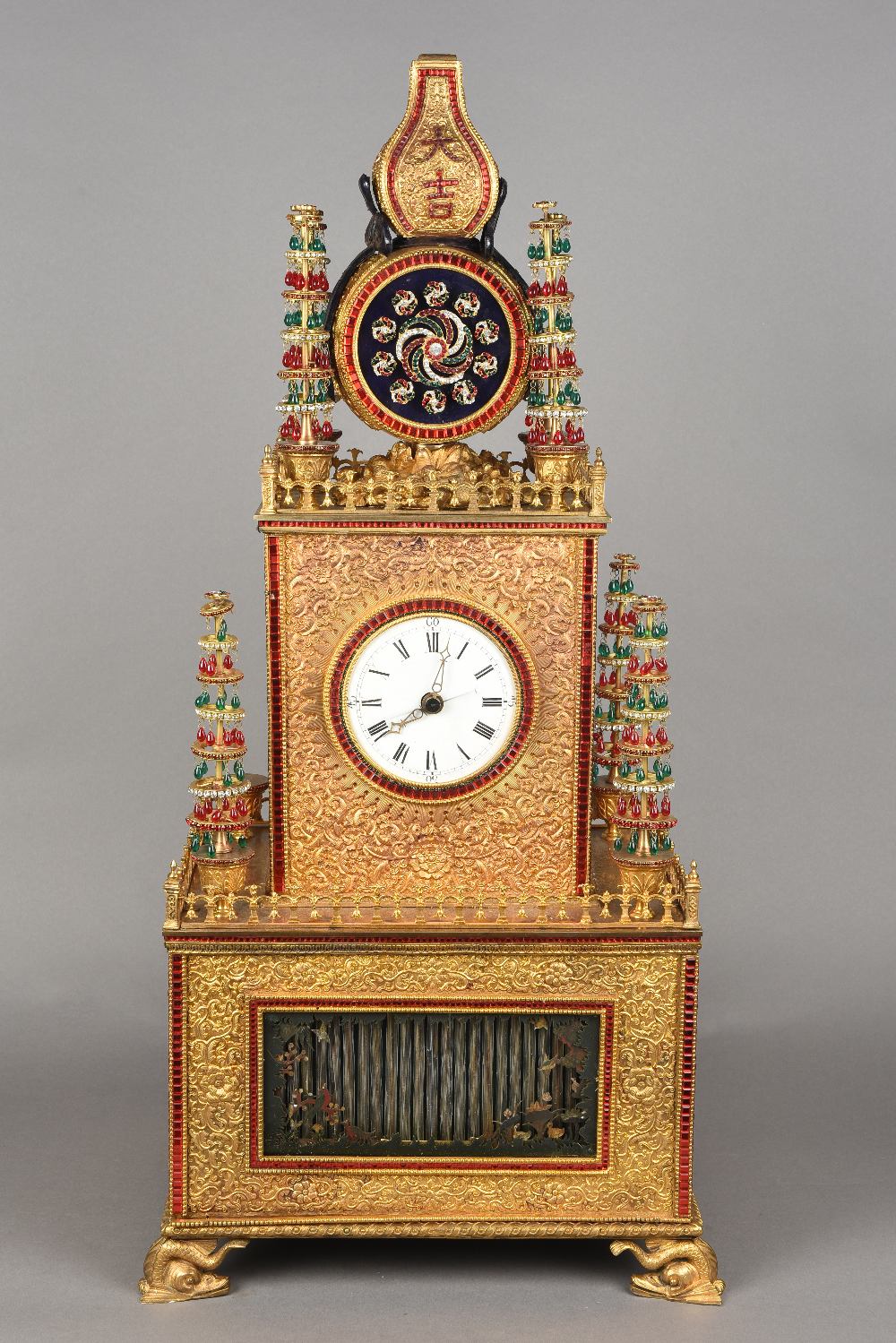 A large and impressive Chinese gilded metal paste set musical automaton table clock The 4 1/2 inch