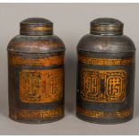 A pair of Victorian tole ware shops tea canisters Each with chinoiserie decoration.