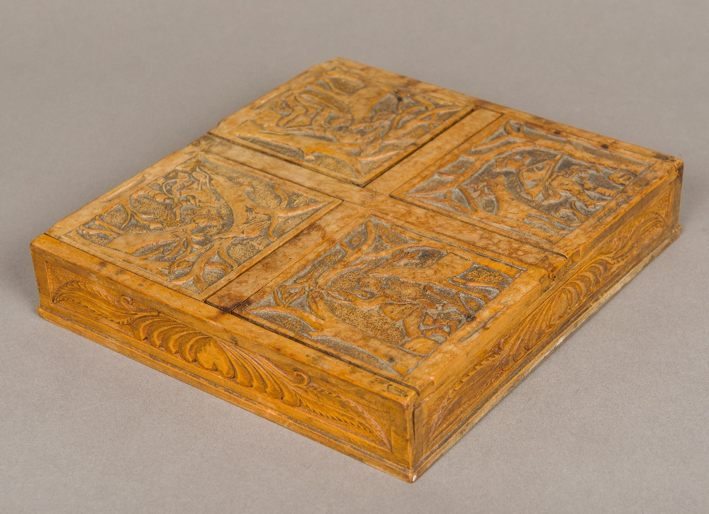 A 19th century Continental treen carved wooden box Of shallow rectangular form,