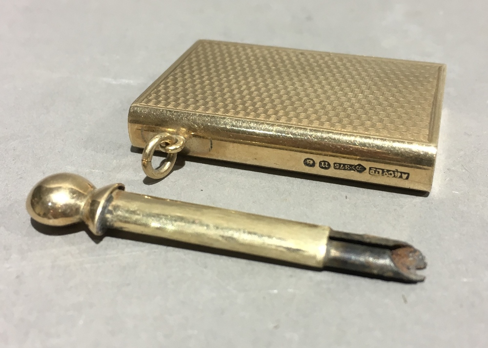 A George V 9 ct gold novelty fob striker by Asprey Modelled as a book. 5 cm long overall. - Image 6 of 9