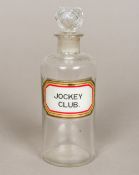 A Victorian apothecary bottle Clear glass with unusual Jockey Club label. 17.5 cm high.