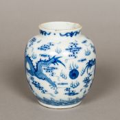 A small Chinese blue and white porcelain vase Of squat ovoid form,