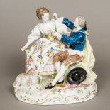 A 19th century Continental porcelain figural group Formed as a young courting shepherd and