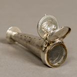 A unusual Victorian unmarked white metal cased extending telescopic fob Embossed to one side with a