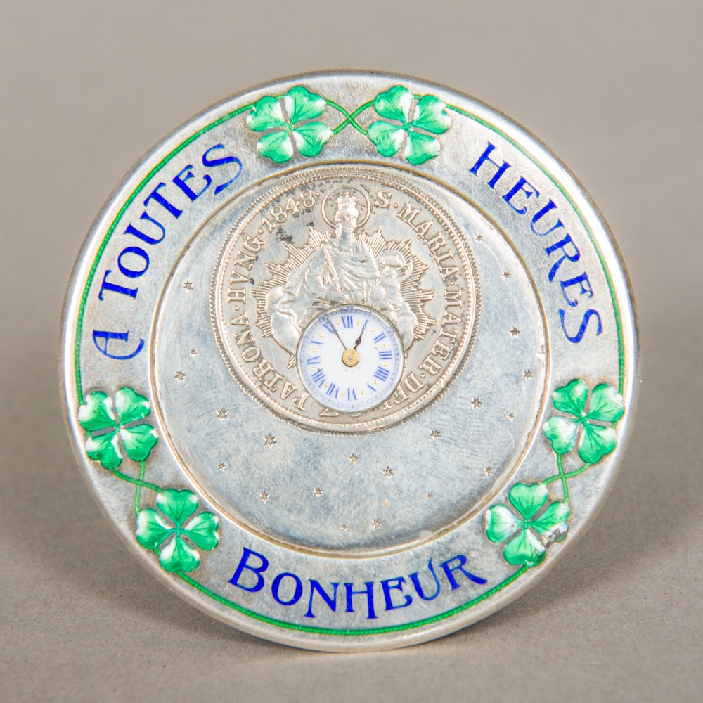 A Continental silver and enamel decorated desk clock Of circular form,