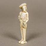 A 19th century ivory netsuke Carved as a figure in the Dutch style, holding a rodent,