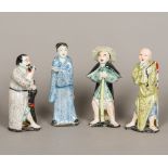 A set of four 19th century Chinese porcelain figures Each modelled standing in a different pursuit.