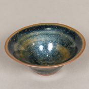 A Chinese Song porcelain oil splash tea bowl Of flared form, with Jian ware glaze,