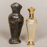 A 19th century French unmarked gold mounted cut glass scent bottle With engraved decorations,