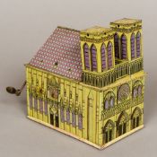 A late 19th/early 20th century German pin lithographic music box Formed as a cathedral. 16.