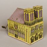 A late 19th/early 20th century German pin lithographic music box Formed as a cathedral. 16.