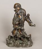 A 19th century Japanese bronze figure of an immortal Modelled in flowing robes embracing a mythical