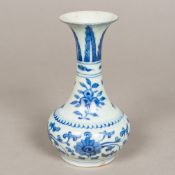 A Chinese blue and white porcelain baluster vase Decorated with floral sprays and lotus strapwork.