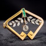 A Russian diamond and emerald set gold brooch Of pierced floral swag form. 3.2 cm wide.