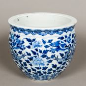 A 19th century Chinese blue and white jardiniere The slightly flared rim with a band of lappet