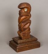 A Maori carved wooden house post Of figural form,