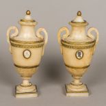 A pair of 18th century carved alabaster lidded urns Of classical form, with removable lids,