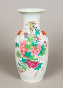 A Chinese porcelain vase Decorated with floral sprays opposing calligraphic text. 43 cm high.