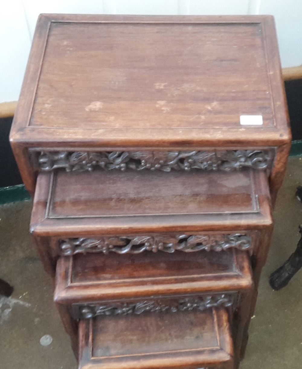 A late 19th century Chinese carved hardwood quartetto nest of tables Each rectangular panelled top - Image 2 of 4