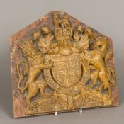 A 19th century carved wooden coat-of-arms of the British Royal Family Typically modelled,
