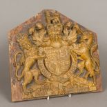 A 19th century carved wooden coat-of-arms of the British Royal Family Typically modelled,