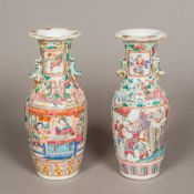A near pair of 19th century Canton famille rose vases Each with twin dog-of-fo handle above four