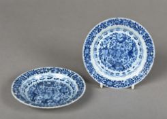 A pair of Chinese blue and white porcelain dishes Each decorated with aquatic animals within a wavy