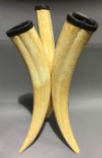 A late 19th/early 20th century walrus tusk centrepiece White metal mounted. 49.5 cm high.