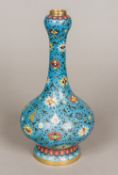 A Chinese cloisonne baluster vase With onion neck and all over lotus strapwork enclosing precious
