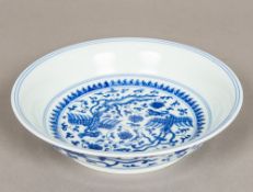 A Chinese blue and white porcelain dished plate Decorated with phoenixes amongst lotus strapwork,