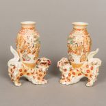 A pair of 19th century Japanese Satsuma vases Each modelled as a figurally decorated vase mounted