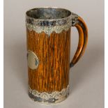 A Victorian silver plate mounted carved wooden faux bamboo tankard,