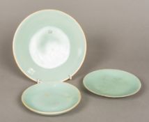 Three Chinese porcelain plates All with celadon glaze,