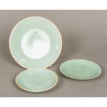 Three Chinese porcelain plates All with celadon glaze,