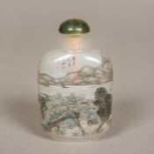 A Chinese carved and inside painted rock crystal snuff bottle and stopper Well decorated with