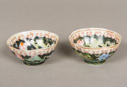 A pair of Chinese famille noir porcelain tea bowls Floral decorated,