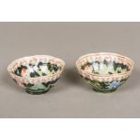 A pair of Chinese famille noir porcelain tea bowls Floral decorated,