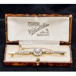 A Victorian 18 ct gold and platinum diamond and pearl bar brooch Centred with a pearl and diamond