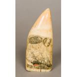 A 19th century polychrome scrimshaw whales tooth One side depicting a ship in a stormy sea,