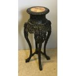 A 19th century Chinese marble topped urn stand The circular marble inset carved top above pierced