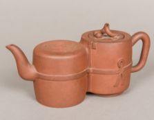 Two Chinese Yixing pottery teapots One worked as twin ribbon tied pots,