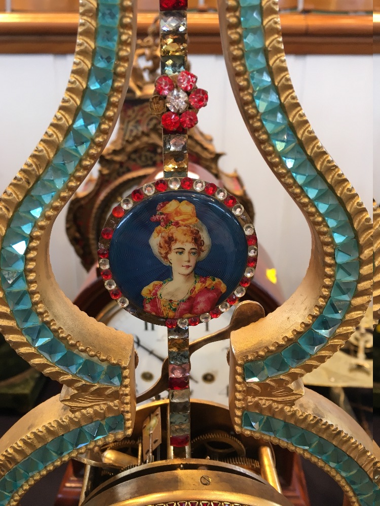 A Chinese gilt metal and coloured paste set mystery clock The 4 inch white painted dial with Roman - Image 5 of 11