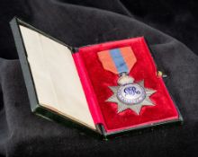 A George V Imperial Service medal Of typical form, cased. The case 14 cm wide.